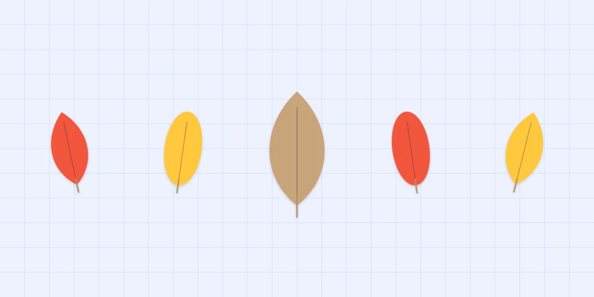 Five paper leaves in oval and pointed shapes in red, yellow and brown, each with a center vein