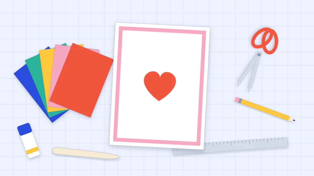 A simple handmade card with a red paper heart beside cardstock, scissors, a ruler, a bone folder and a glue stick