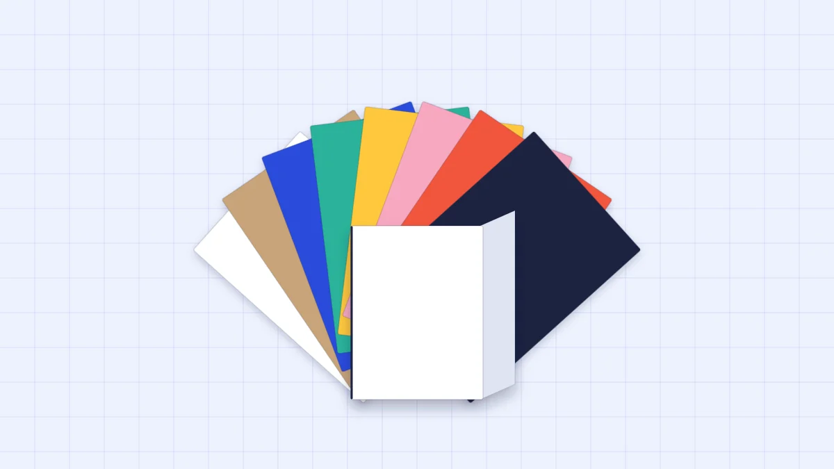 A fan of cardstock sheets in several bright colors with a folded white card base in front