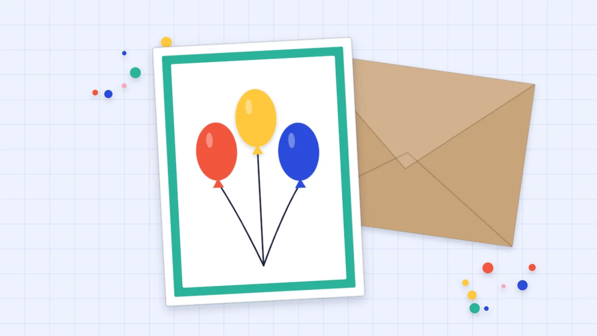 A handmade birthday card with three paper balloons in red, yellow and blue and a kraft envelope