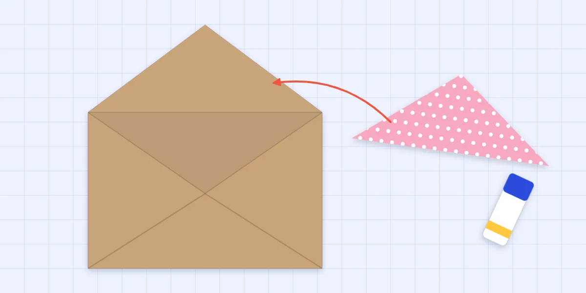 An open envelope with a patterned paper liner cut to fit the flap, beside a glue stick