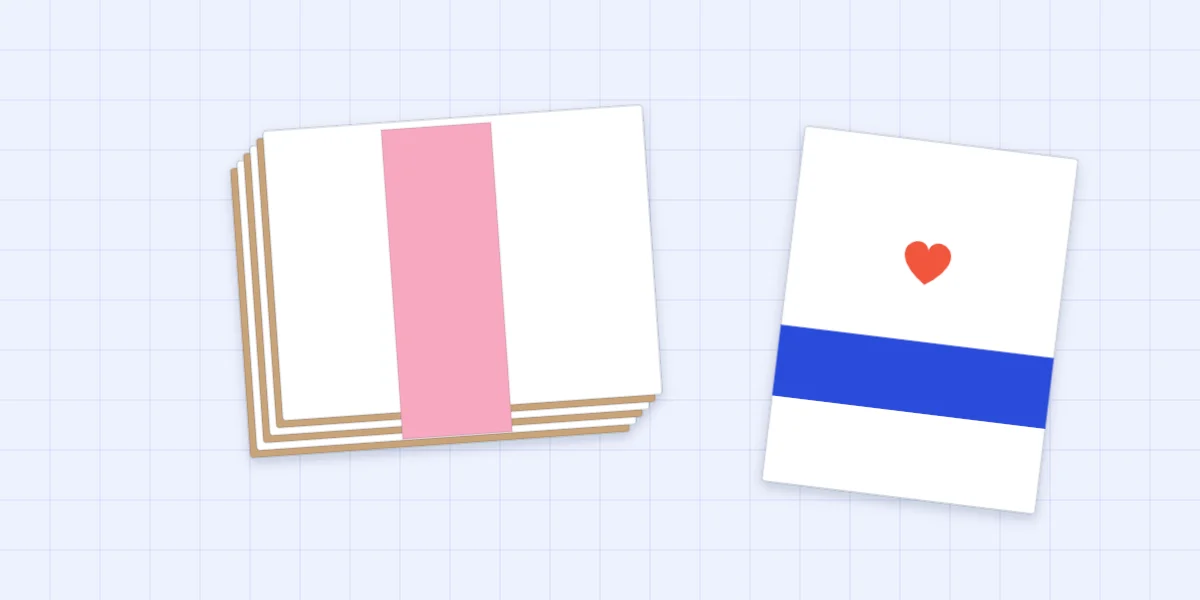 A stack of matching cards and envelopes wrapped with a paper band, with one card beside it